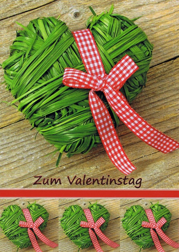 Karte zum Valentinstag mit einem Herz aus Gras gebunden